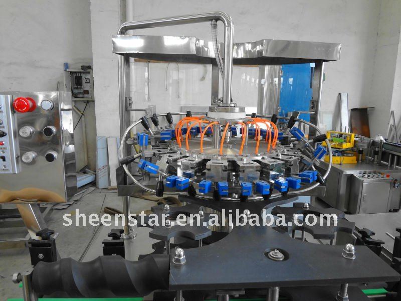 Rotary bottle washing machine