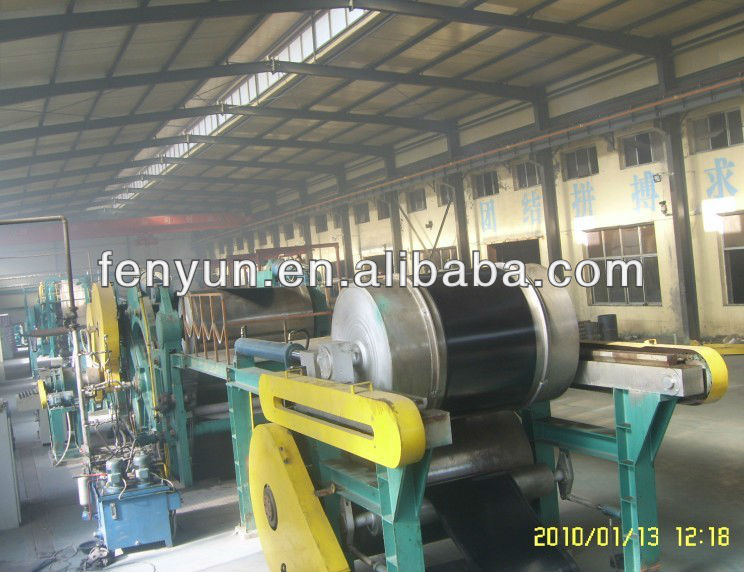 Roto-cure rubber vulcanizing machine