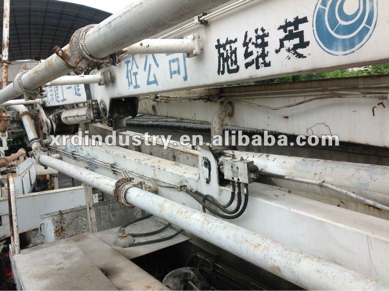 Schwing used concrete pump with truck