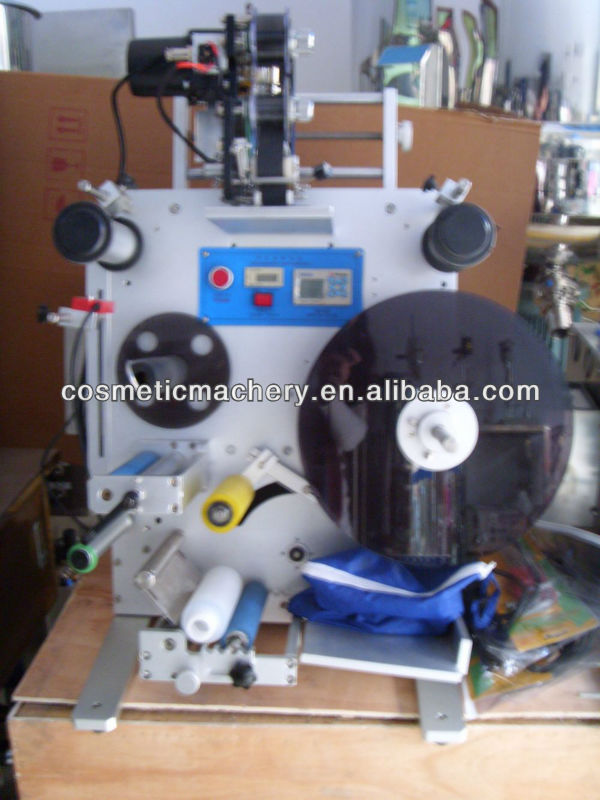 Semi-automatic round bottle labeling machine with date code