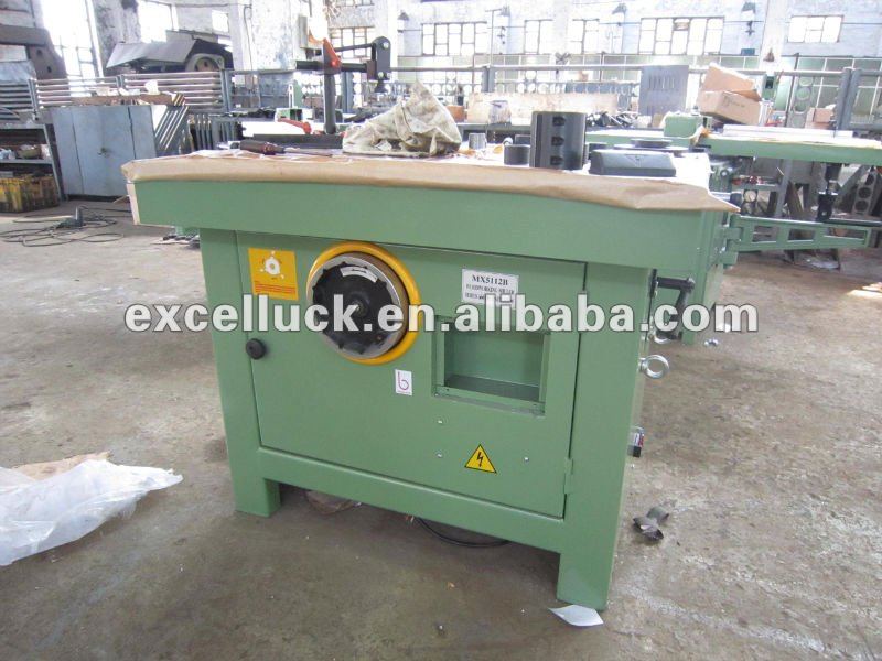 Spindle shaper woodworking machine