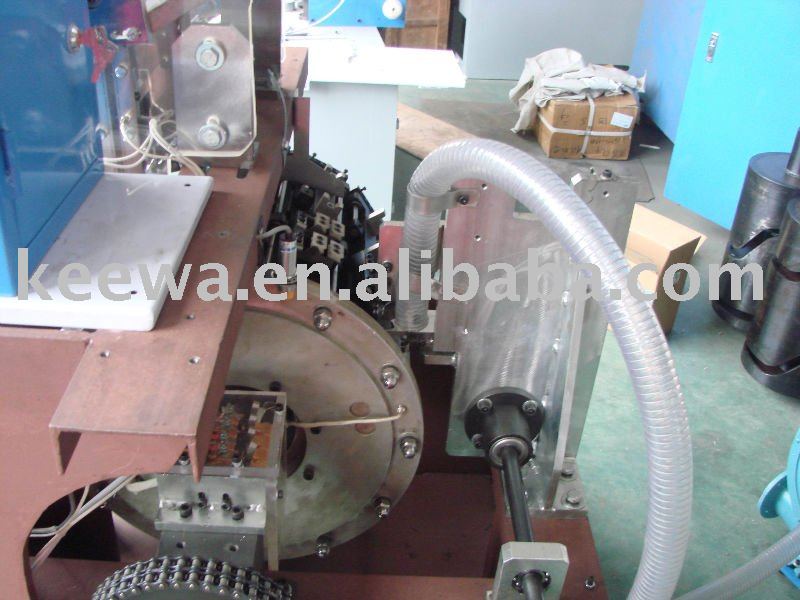 Spoon-straw making machine