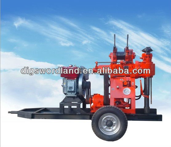 Trailer mounted water well drilling rig