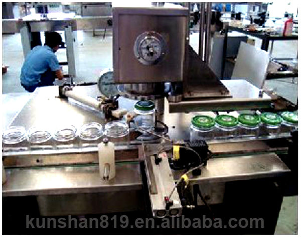 Vacuum capping machine