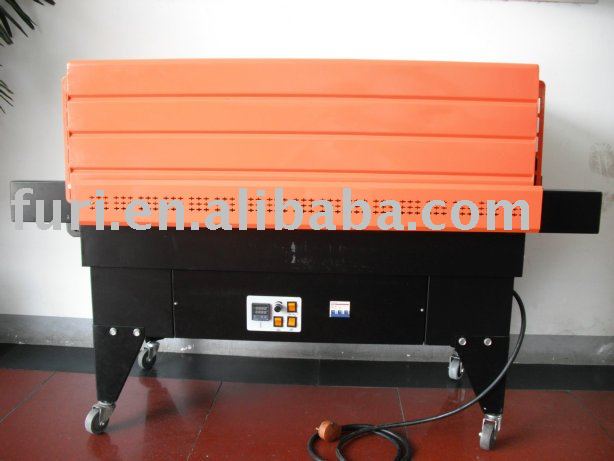 Vacuum shrink packing machine