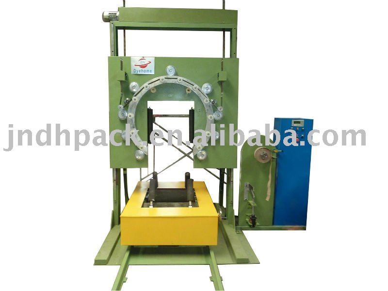 Vertical ring wrapping machine