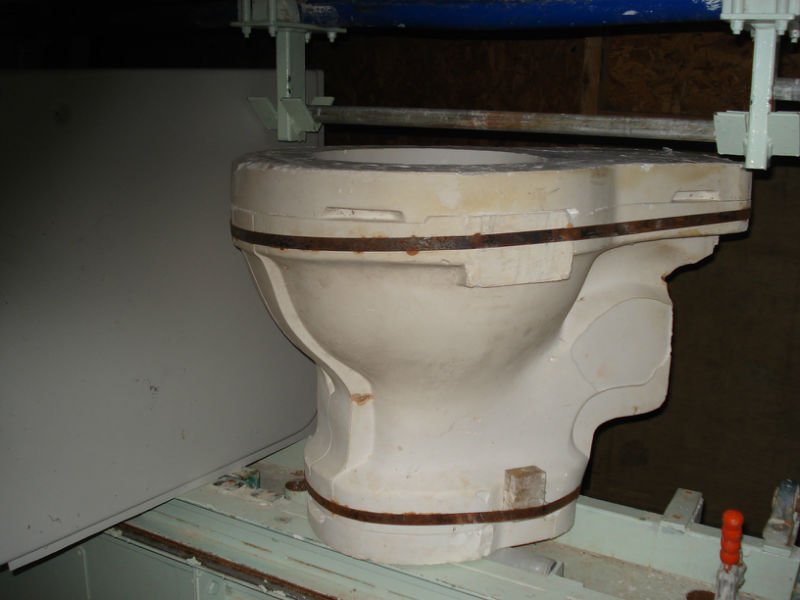 Water closet casting machine