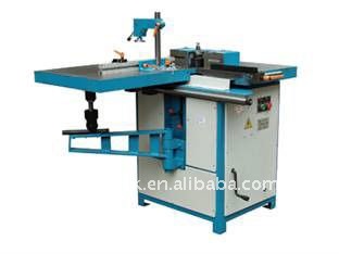 Woodworking spindle moulder with sliding table