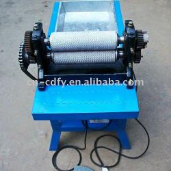 Apis mellifera comb foundation roller mill