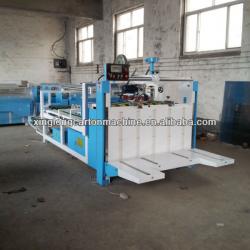 Corrugated carton gluing machine