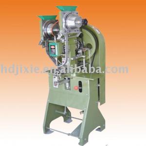 Double head eyelet machine