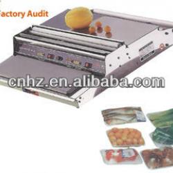 Food hand wrapping machine