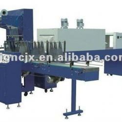 Fully automatic PE film shrinking packaging machine