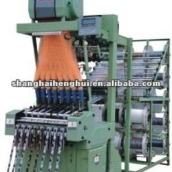 High speed shuttle less ribbon needle loom machine