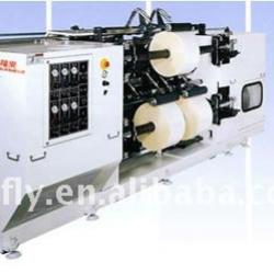 Laminating film slitting and rewinding machine