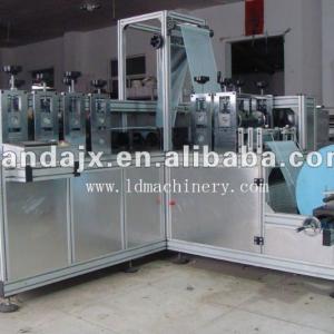 Non woven shoe cover making machine