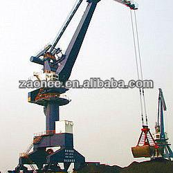 Portal cranes with grab for bulk goods yard