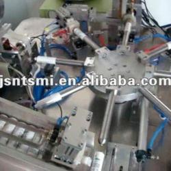 Rotary filling and capping machine