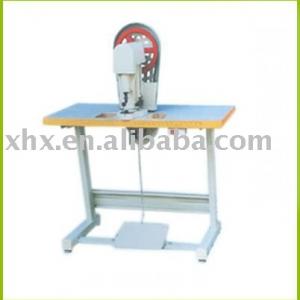 Semi-automatic eyelet machine for file folder