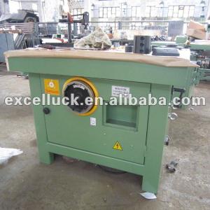 Spindle shaper woodworking machine