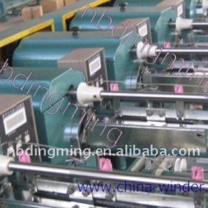 Thread winding machinery for king spool bobbin.