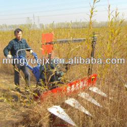 Wheat harvester for walking tractor
