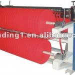 Non woven fabric slitting and rewinding machine