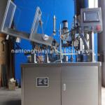 Automatic tube filling and sealing machine