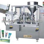 Automatic tube filling and sealing machine