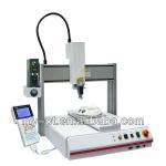 Desktop adhesive dispensing machine