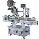 top label applicator