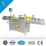 Adhesive sticker up and down fixed position labeling machine