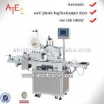 Automatic top side surface labeling machine for flat surface and cap ect