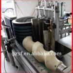 Automatic round bottle wet glue labeling machine