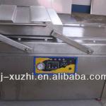 Dual chamber vacuum packing machine