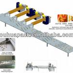 Food automated packaging system with flow wrapping machine