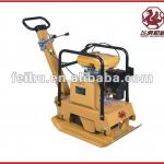 Reversible vibratory plate compactor