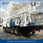 Pneumatic track mounted drilling rig machine