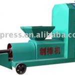 Charcoal briquette machine