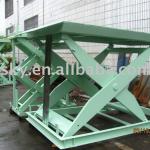 Stationary scissor lift