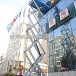 10m lifting height high altitude platform electricity/diesel power self propelled Four-wheel mobile scissor lift