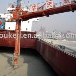 Screw type ship unloader
