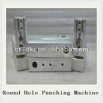Automatic film punching machine