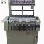 Webbing needle loom