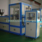 Rotary plastic cap molding machine