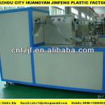 Plastic cap slitting machine