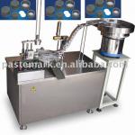 Induction seal lining machine