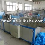 Nonwoven surgical cap machine