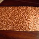Rough surface rubber for air jet loom