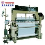 WATER JET POWER LOOM WEAVING MACHINE,